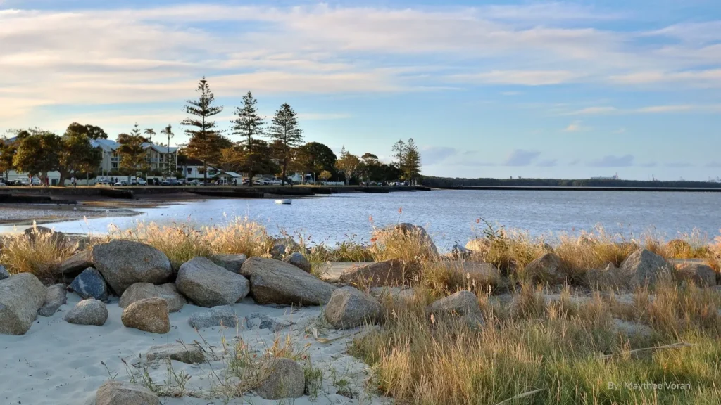 Wynnum Foreshore, Brisbane β tidal pool, calm bay waters and parklands at sunset