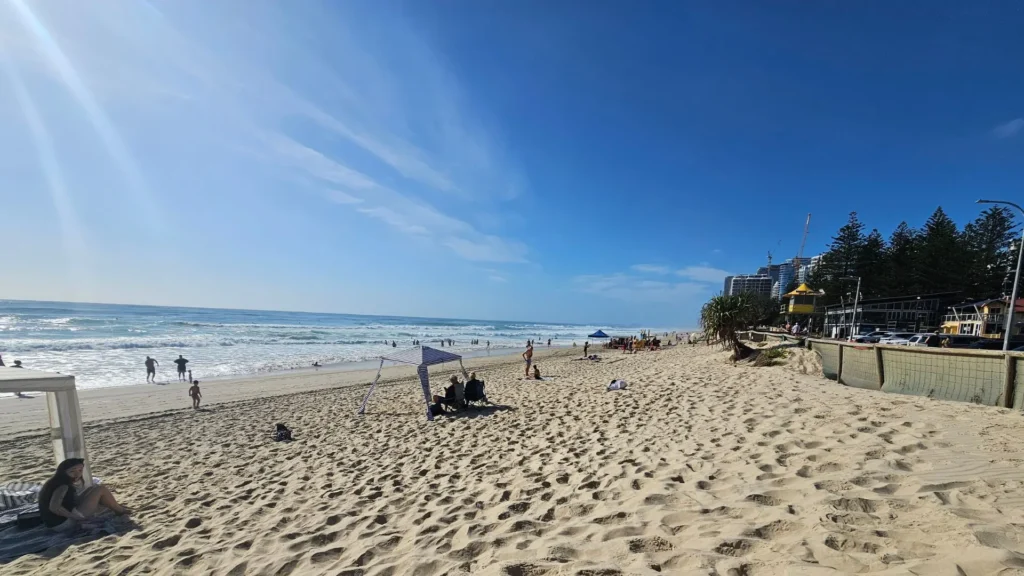 Sandy stretch of Main Beach Southport looking towards the buildings and ocean