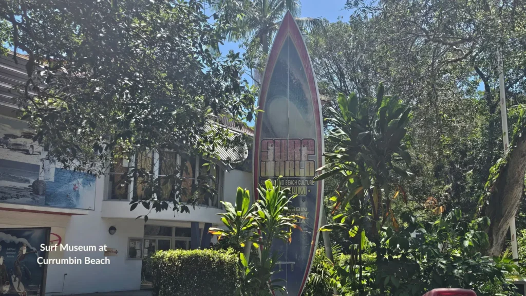 Surf Museum at Currumbin Beach with large surfboard sculpture and tropical greenery